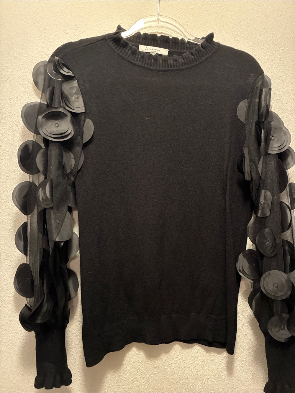 Sioni Black Crewneck Sweater with Sheer Floral Appliqué Sleeves